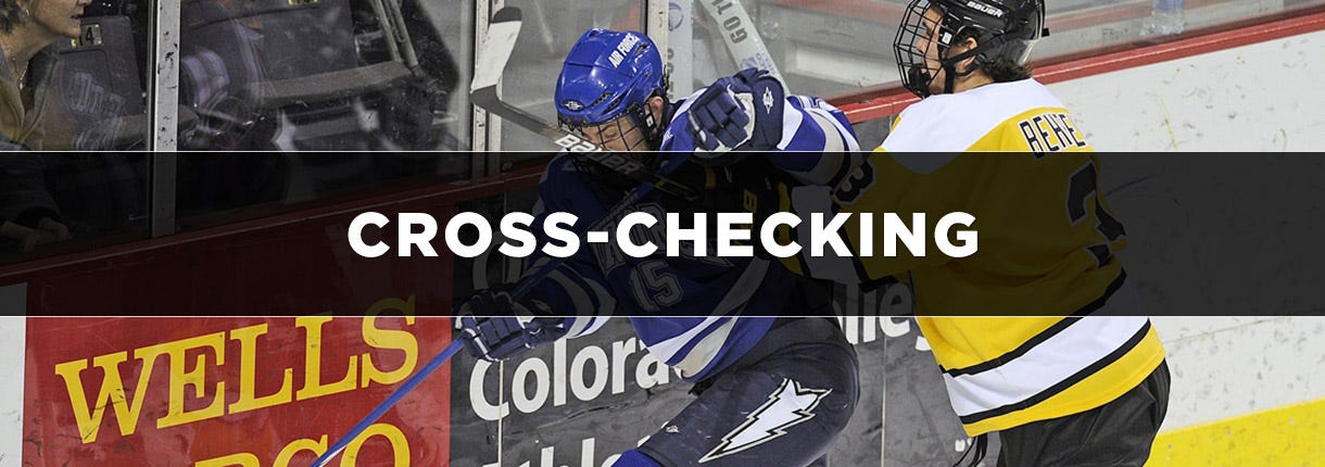 What is cross-checking in hockey?