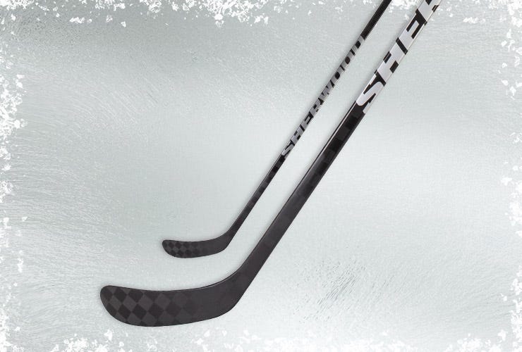 Sherwood Mystery hockey sticks on an icy background