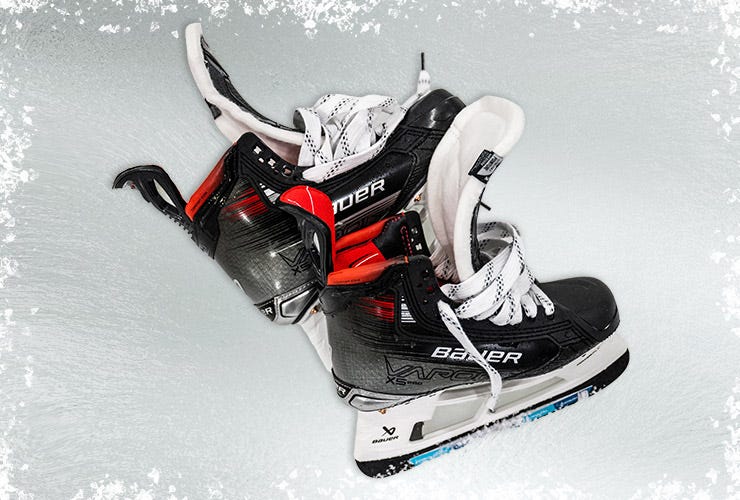 Bauer Vapor X5 Pro hockey skates on an icy background