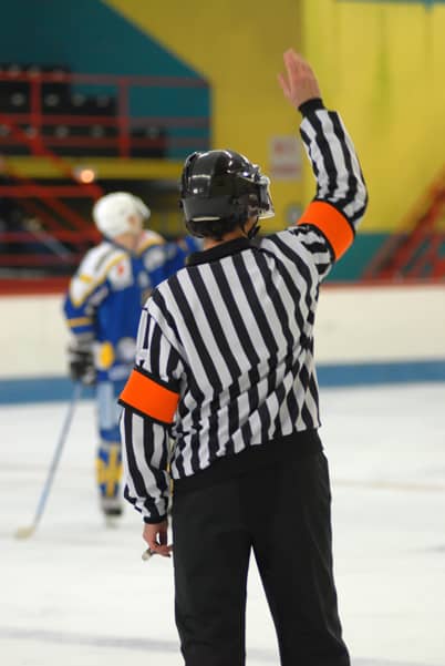 referee signal for icing in hockey