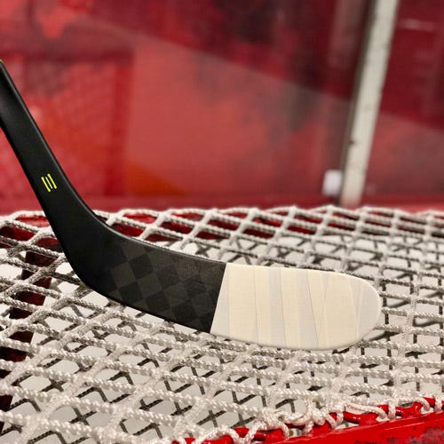 How to Tape a Hockey Stick From the Blade to the Handle and Butt